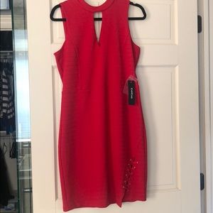 Red knit Bebe fitted dress with accent on front